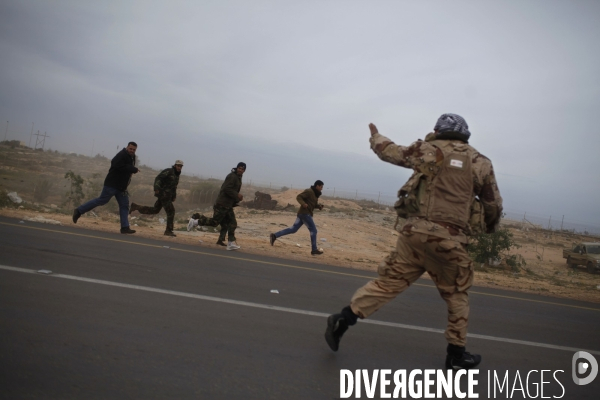 Battle in libya between rebels and pro kadhafi, on the front line.