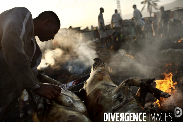 Marche de port-au-prince: abattoir et preparation des porcs.