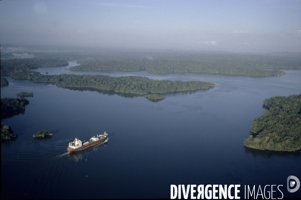 Cargo ship in panama canal: chagres lake near baro colorado.