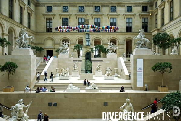 Illustration Juin 2013.Oeuvre de l artiste italien Pistoletto sous la verriere de la cour Marly au musée du Louvre