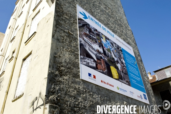 Illustration Avril 2014. Un panneau indique que la ville va aménager son entrée de ville grace a la contribution financirre de l ANRU.