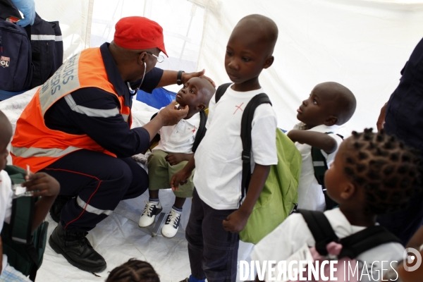 113 enfants haitiens en instance d adoption par des parents francais, sont evacues par avion.