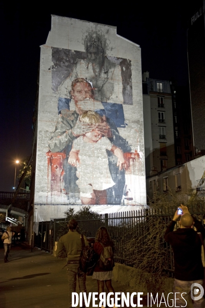 Nuit Blanche 2014.Oeuvre de Borondo, les trois Anges , sur une mur pignon de la rue du Chevaleret.