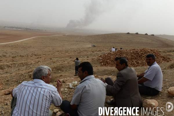 Combat in Kobani, Turkey-Syria Border. Combat dans Kobané, Frontaliers entre Syrie et Turquie.