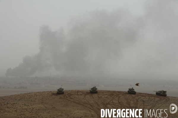 Combat in Kobani, Turkey-Syria Border. Combat dans Kobané, Frontaliers entre Syrie et Turquie.