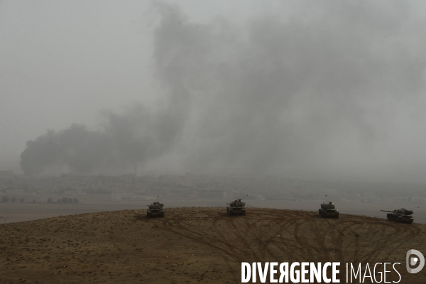 Combat in Kobani, Turkey-Syria Border. Combat dans Kobané, Frontaliers entre Syrie et Turquie.