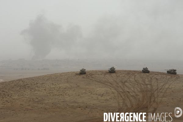 Combat in Kobani, Turkey-Syria Border. Combat dans Kobané, Frontaliers entre Syrie et Turquie.