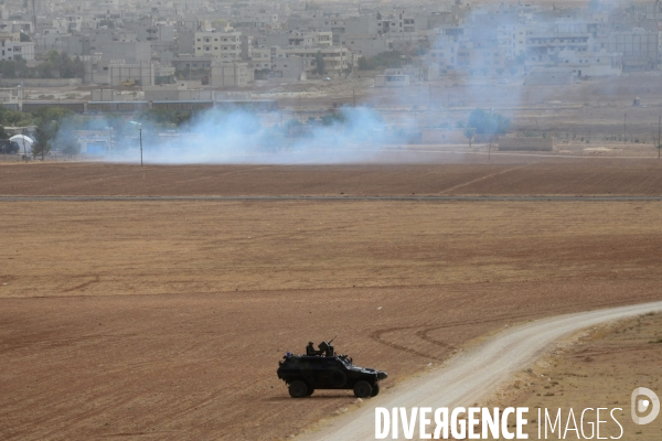 Combat in Kobani, Turkey-Syria Border. Combat dans Kobané, Frontaliers entre Syrie et Turquie.