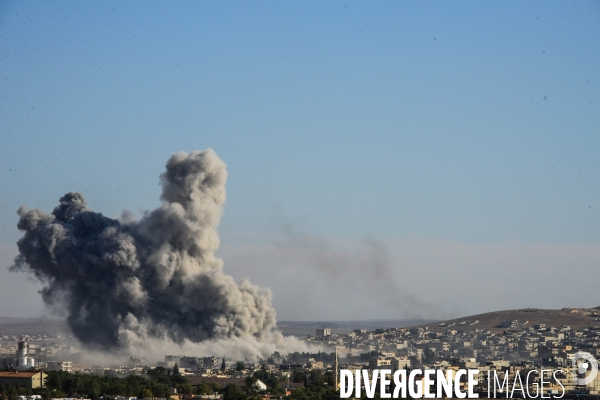 Combat in Kobani, Turkey-Syria Border. Combat dans Kobané, Frontaliers entre Syrie et Turquie.