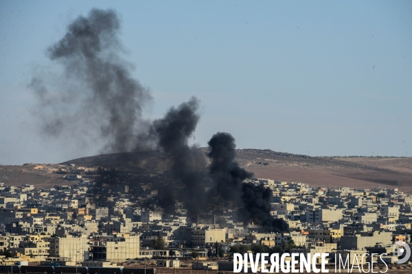 Combat in Kobani, Turkey-Syria Border. Combat dans Kobané, Frontaliers entre Syrie et Turquie.