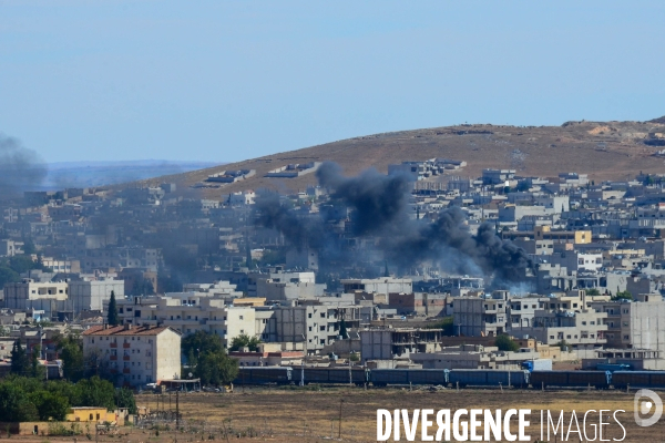 Combat in Kobani, Turkey-Syria Border. Combat dans Kobané, Frontaliers entre Syrie et Turquie.