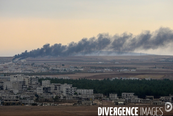 Combat in Kobani, Turkey-Syria Border. Combat dans Kobané, Frontaliers entre Syrie et Turquie.