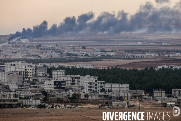 Combat in Kobani, Turkey-Syria Border. Combat dans Kobané, Frontaliers entre Syrie et Turquie.