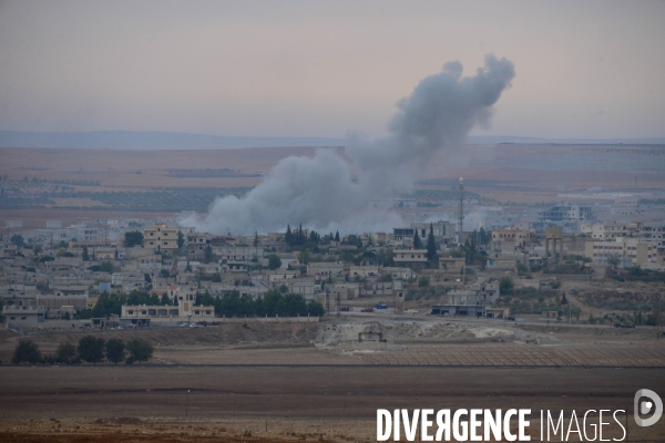 Combat in Kobani, Turkey-Syria Border. Combat dans Kobané, Frontaliers entre Syrie et Turquie.