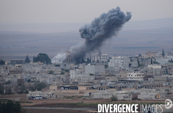 Combat in Kobani, Turkey-Syria Border. Combat dans Kobané, Frontaliers entre Syrie et Turquie.