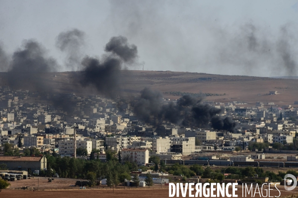 Combat in Kobani, Turkey-Syria Border. Combat dans Kobané, Frontaliers entre Syrie et Turquie.