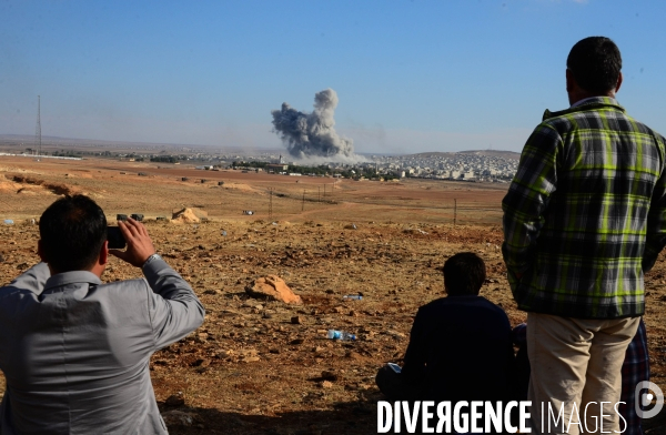 Combat in Kobani, Turkey-Syria Border. Combat dans Kobané, Frontaliers entre Syrie et Turquie.