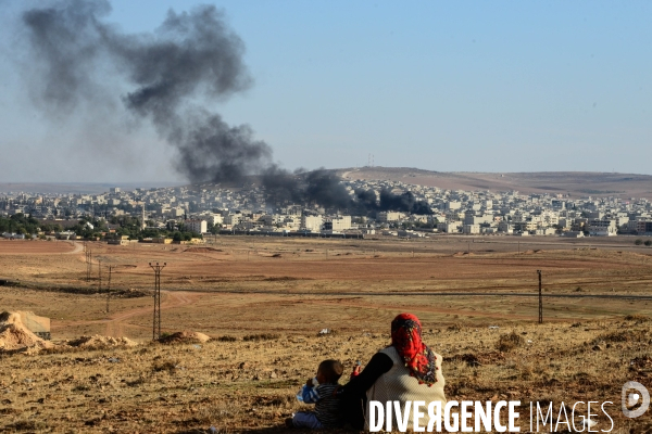 Combat in Kobani, Turkey-Syria Border. Combat dans Kobané, Frontaliers entre Syrie et Turquie.