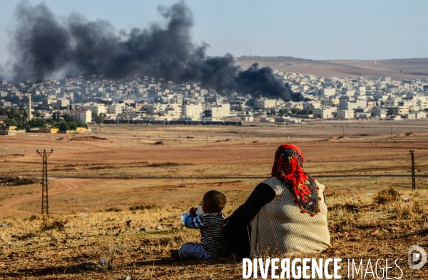 Combat in Kobani, Turkey-Syria Border. Combat dans Kobané, Frontaliers entre Syrie et Turquie.