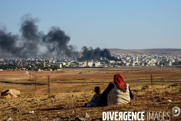 Combat in Kobani, Turkey-Syria Border. Combat dans Kobané, Frontaliers entre Syrie et Turquie.