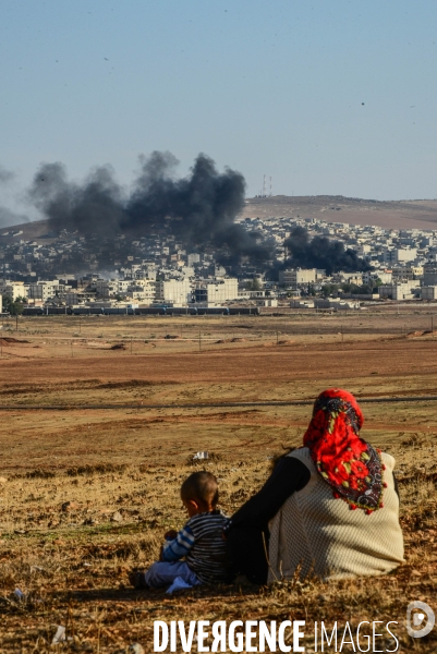 Combat in Kobani, Turkey-Syria Border. Combat dans Kobané, Frontaliers entre Syrie et Turquie.