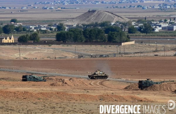 Combat in Kobani, Turkey-Syria Border. Combat dans Kobané, Frontaliers entre Syrie et Turquie.