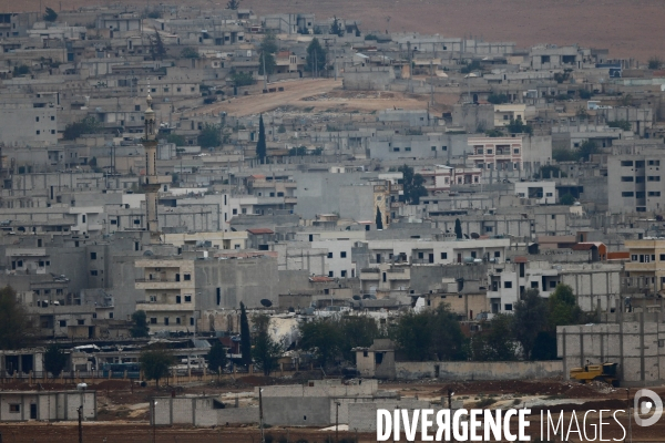 Combat in Kobani, Turkey-Syria Border. Combat dans Kobané, Frontaliers entre Syrie et Turquie.