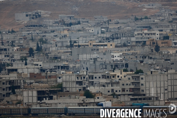 Combat in Kobani, Turkey-Syria Border. Combat dans Kobané, Frontaliers entre Syrie et Turquie.