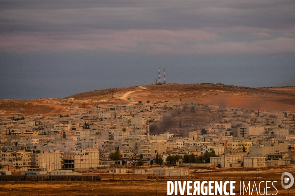 Combat in Kobani, Turkey-Syria Border. Combat dans Kobané, Frontaliers entre Syrie et Turquie.