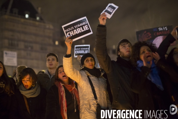 Affaire charlie hebdo. rassemblement sur la place de la republique, en hommage aux victimes de la tuerie dans les locaux de charlie hebdo.