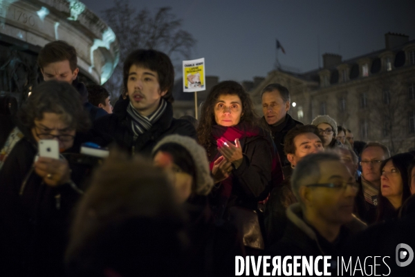 Affaire charlie hebdo. rassemblement sur la place de la republique, en hommage aux victimes de la tuerie dans les locaux de charlie hebdo.