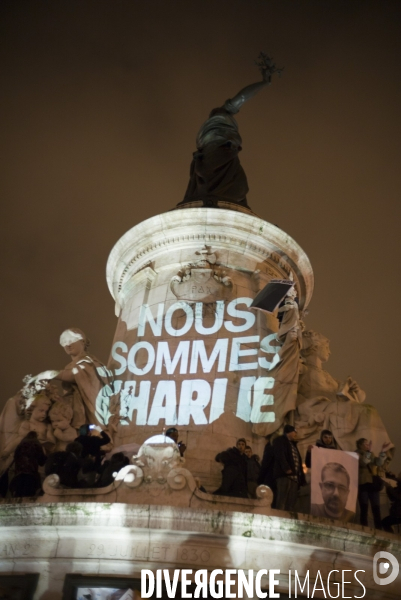 Affaire charlie hebdo. rassemblement sur la place de la republique, en hommage aux victimes de la tuerie dans les locaux de charlie hebdo.