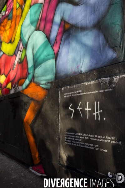 Le street artist graffeur SETH (Julien MALLAND) réalise une oeuvre commandée par L association le M.U.R (Modulable, Urbain Réactif), tue Oberkampf.