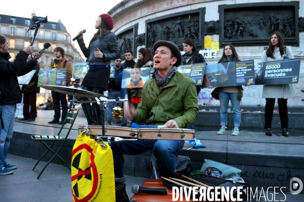 Illustration Mars 2015.Manifestation  commune de Sortir du nucleaire, et de Yosomono-net, reseau international de ressortissants japonais contre le nucleaire, de Greenpeace, place da la Republique