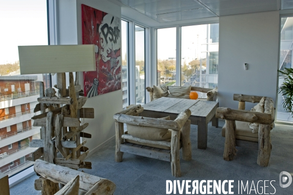 Au nouveau  siege de Coca-Cola France. Ses amenagements interieurs ont obtenu le certificat BREEAM Fit-Out Outstanding, une premiere mondiale.
