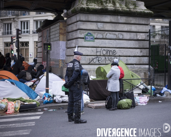 Evacuation de réfugiés africains à la la Chapelle.